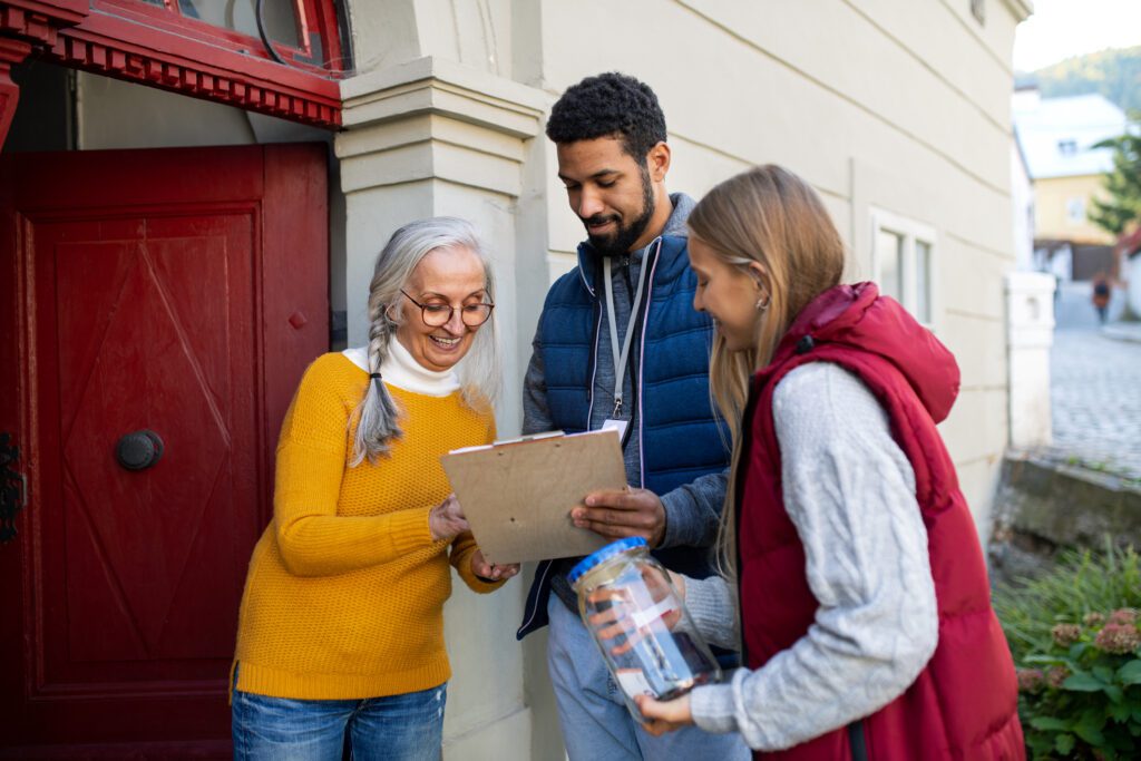 volunteers campaigning door to door in illinois